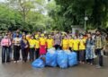 Maid In India Leads Cleanliness Drive at Delhi Protest Site. Yellow T-Shirts, Blue Bags, One Mission.