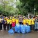 Maid In India Leads Cleanliness Drive at Delhi Protest Site. Yellow T-Shirts, Blue Bags, One Mission.